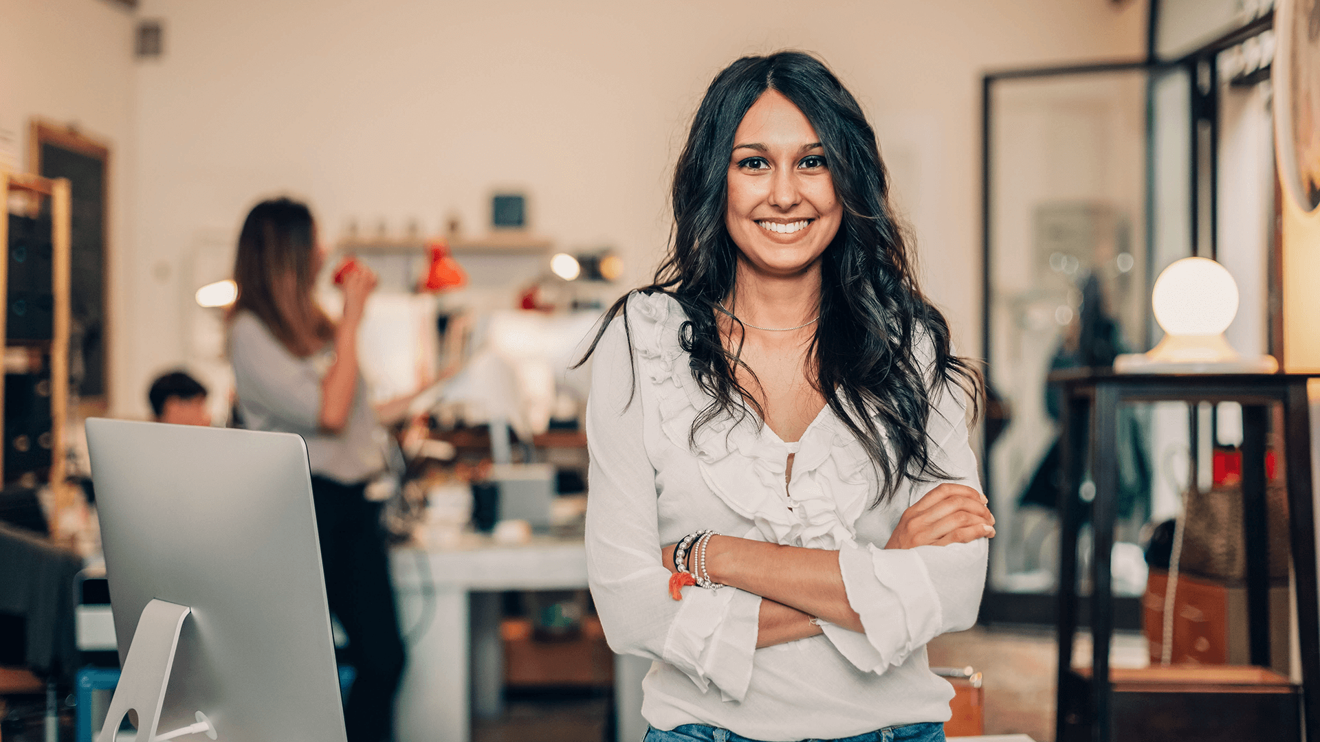 Woman in white shirt smiling